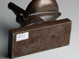 a metal object that is sitting on top of a box
