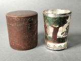 pair of antique wooden boxes and a glass with a picture of a tree