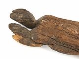 a piece of wood that is laying down on the ground