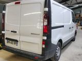 a white van that is parked in a garage