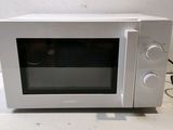 a white microwave oven sitting on a counter top