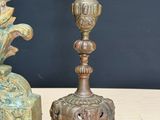two vases that are sitting next to each other on a table