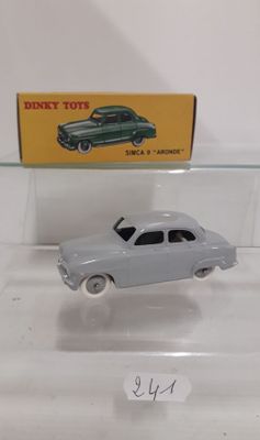 a toy car that is on display in a glass case