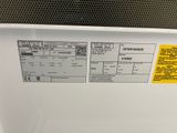 an image of a close up of a dishwasher with a label on it