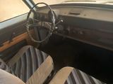 a car with a steering wheel and a seat in it