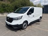 a picture of a white van parked in a parking lot