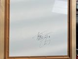 une photo d'un chevalet sur lequel est posé un dessin