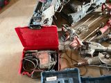 a lot of tools that are sitting on the floor