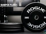 a black and white picture of a barbell plate and a black and white picture of a barbell plate