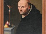 portrait d'un homme tenant un crucifix et une statue de Jésus