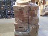 a large stack of boxes sitting on a pallet in a warehouse