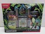 une boîte de cartes Pokémon posée sur une table