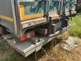 a truck that is parked on the side of the road