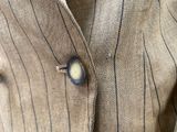 a close up of a button on a jacket