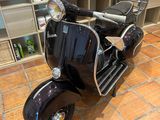 a motor scooter that is parked in a store
