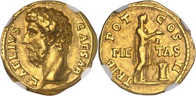 a gold coin with a woman on it and a man on the other side
