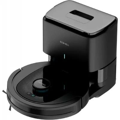 a close up of a black robot on a white surface