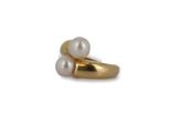 pearl and gold ring on a white background