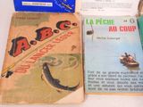 two books are sitting on a table next to each other
