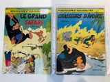 two comics are sitting on a table next to each other