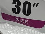 a plastic bag with a pair of shoes inside of it