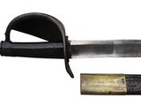 a picture of a knife with a brass handle and a black sheath