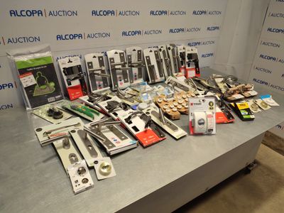 a lot of electronic equipment on a table in a room