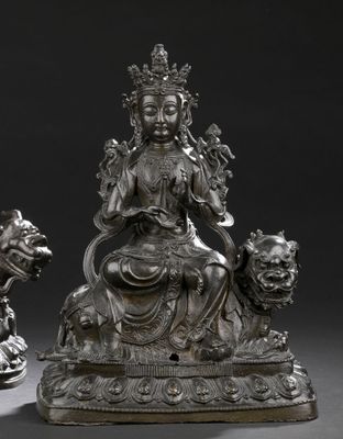 pair of chinese silver figurines of a seated woman and a lion