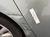 a sticker on the side of a car that has a sticker on it