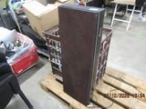 a picture of a large speaker on a pallet in a warehouse
