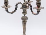 silver plated candelabra with four candles and a bird