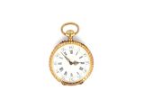 une montre de poche en or avec des chiffres romains sur le cadran