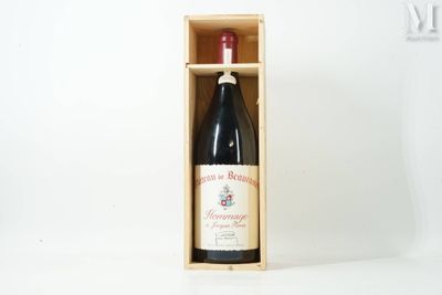 a bottle of wine in a wooden box on a table