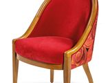 an image of a red chair with wooden legs and a red cushion