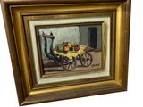 tableau représentant un chariot rempli de fruits posé sur une table en bois