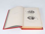 an open book with a picture of two people on it