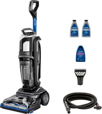 un aspirateur muni d'un tuyau et d'autres accessoires de nettoyage