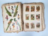 an open book with pictures of people and plants on it
