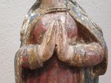 a statue of a woman holding a baby in her arms