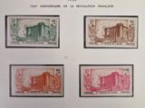 a group of stamps from different countries on a sheet of paper