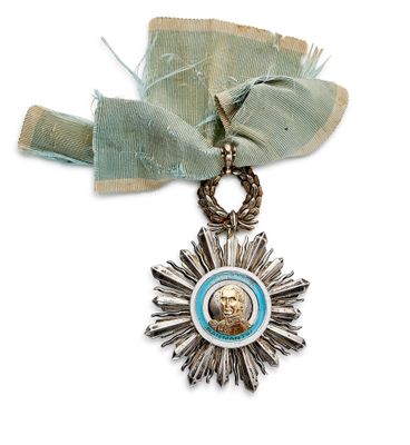 une médaille sur laquelle figure l'effigie d'un homme