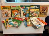 de nombreux livres pour enfants posés sur une table devant une fenêtre