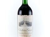 a bottle of wine that is sitting on a table