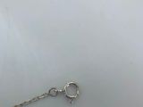 a close up of a silver chain with a clasp on it