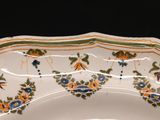 a white plate with a floral design on it
