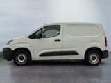 a picture of a white van parked in a parking lot