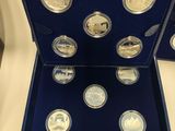 an image of a blue box with six different coins in it