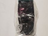 a cell phone wrapped in a plastic bag on a table
