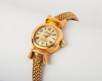 an image of a close up of a wrist watch on a white surface