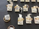 a lot of rings and bracelets on display on a table